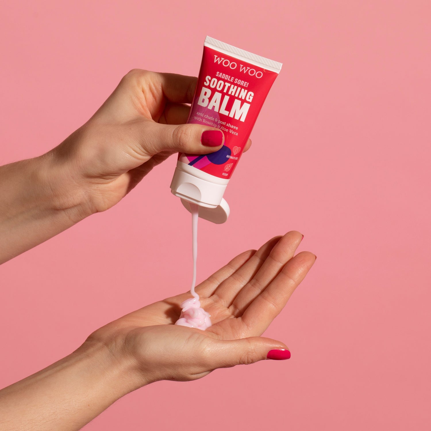 Tube of Soothing Balm being poured into an open  hand